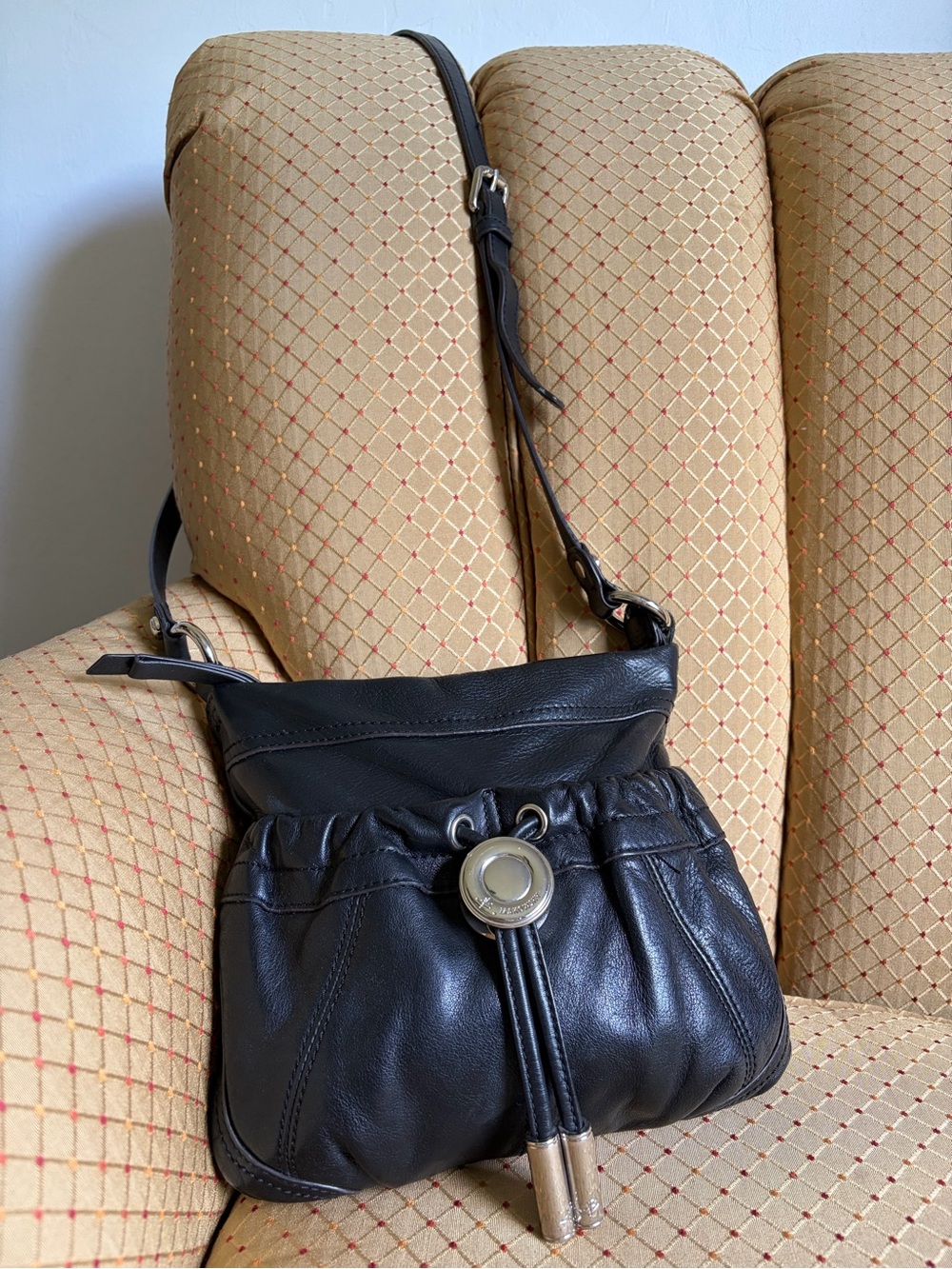 b. makowsky Black Leather Shoulder Bag with Tassel and Medallion